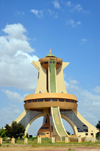 Ouagadougou, Burkina Faso: Martyr's Monument aka Monument to the National Heroes, central element of Place de l'Afrique, Ouaga 2000 quarter - a short version of the Eiffel tower, built in concrete - Monument des Martyrs / Mémorial aux Héros nationaux - photo by M.Torres