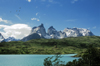 Torres del Paine National Park, Magallanes region, Chile: Cuernos del Paine - the Horns of Paine from Lake Nordenskjöld – ducks in flight - Chilean Patagonia - photo by C.Lovell