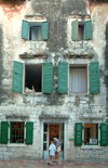 Montenegro - Crna Gora - Kotor: façade - residential building - green shutters - photo by J.Banks