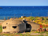 Porto Torres / Pòltu Tòrra, Sassari province, Sardinia / Sardegna / Sardigna: coastal bunker in ruins - a touch of Albania - photo by M.Torres
